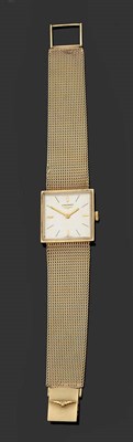 Lot 371 - A 9ct Gold Wristwatch, signed Longines, circa 1975, 17-jewel lever movement, textured silvered dial