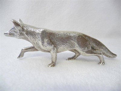 Lot 414 - An Elizabeth II Model of a Fox,  A E Jones, Birmingham 1975, realistically cast, 16cm long, 7oz...