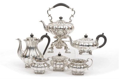 Lot 423 - A George V Six Piece Tea and Coffee Service, maker's mark E&Co, Birmingham 1920, each piece of...