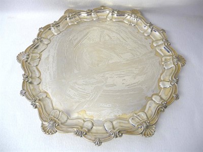 Lot 433 - An Edward VII Salver, Atkin Bros, Sheffield 1909, shaped circular with shell and scroll rim,...