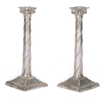 Lot 438 - A Pair of Victorian Candlesticks, William Hutton & Sons Ltd, London 1897 and 1901, the stepped...