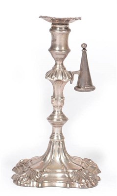 Lot 468 - A George III Taperstick, Ebenezer Coker, London 1771, cast shell and scroll pattern, with...