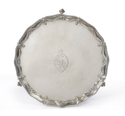 Lot 481 - A George III Salver, Richard Rugg, London 1774, shaped circular with tied swag and paterae...