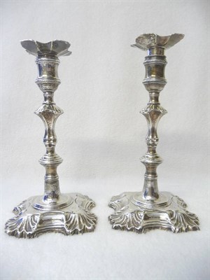 Lot 500 - A Pair of George II Candlesticks, John Cafe, London 1748, cast shell and scroll pattern, each...