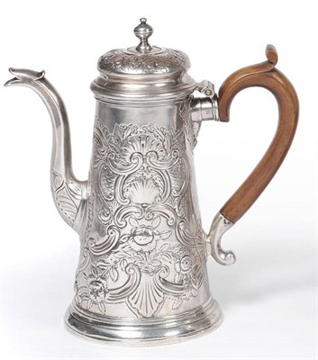 Lot 503 - A George I Coffee Pot, London 1724, of tapering cylindrical form with wood scroll handle, domed...