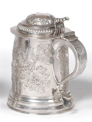 Lot 505 - A Queen Anne Tankard, John Martin Stockar & Edward Peacock, London 1709, the cylindrical body later