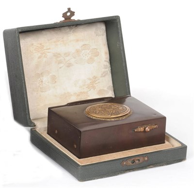 Lot 575 - An Ebonite Singing Bird Musical Box, probably Swiss, circa 1910, the rectangular ebonite case...