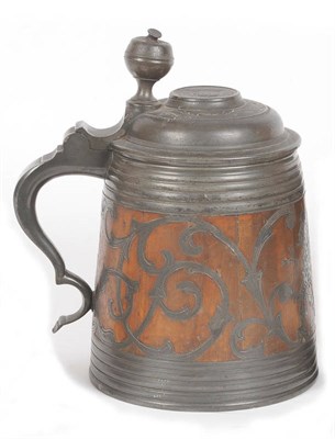 Lot 576 - A Swedish Pewter and Wood Bodied Daubenkrug, Santesson, Stockholm, circa 1890, of slightly...