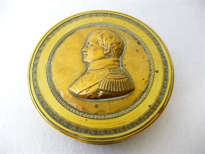 Lot 583 - A French Gilt Brass Napoleon Bonaparte Snuffbox, early 19th century, circular, the engine...