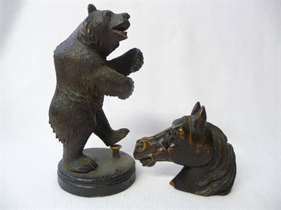 Lot 588 - A Swiss Carved Linden Wood Figure of a Dancing Bear, circa 1900, the naturalistically carved...