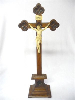 Lot 595 - A Carved Ivory Figure of Christ Crucified, probably French, late 19th century, upon an oak...