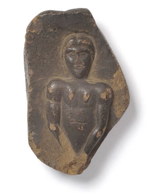 Lot 601 - A Carved Stone Fragment, thought to depict Sheela-Na-Gig, perhaps Medieval or earlier, the fragment