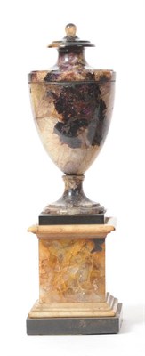 Lot 626 - A Derbyshire "Blue John" Spar Classical Urn on Stand, early 19th century, the integral shallow...