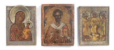 Lot 641 - A Russian Icon, The Mother of God of Smolensk, probably 18th century, within a gilt metal...