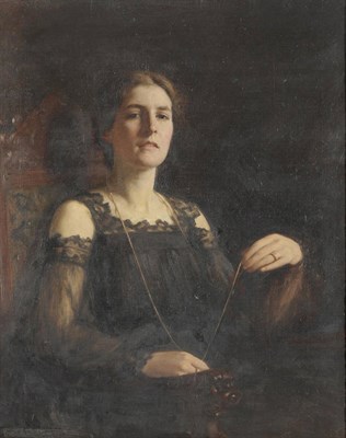 Lot 958 - Frank Samuel Eastman (1878-1964) "Constance", portrait of a lady, seated, wearing a black...