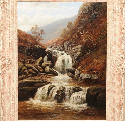 Lot 981 - William Mellor (1851-1931) Rocky Waterfall Scene with Sheep Grazing on a Hillside Signed, oil...