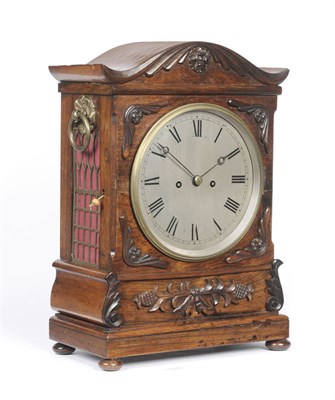 Lot 1014 - A Rosewood Striking Bracket Clock, circa 1840, case with arched top and applied carved mounts, side