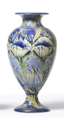 Lot 1029 - A Macintyre Moorcroft Florian Ware "Poppy" Vase, in typical blues, yellow and green, printed...