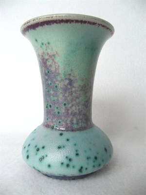 Lot 1041 - A Ruskin High Fired Pottery Vase, with green and black speckled in lavender and turquoised...