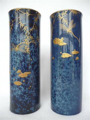 Lot 1042 - A Matched Pair of Royal Doulton Titanian Ware Vases, by Robert Allen, of cylindrical design, gilded