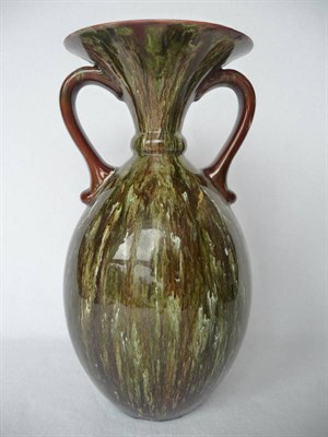 Lot 1045 - A Linthorpe Pottery Twin-Handled Vase, Shape No.1073, green and white streaky glaze on a brown...