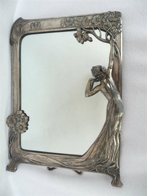 Lot 1066 - An Art Nouveau WMF Plated Figural Easel Mirror, cast with a scantily clad maiden cupping her...