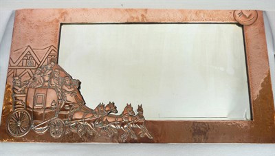 Lot 1072 - An Arts & Crafts Copper Mirror, of rectangular design, cast with a coaching scene and a smiling...