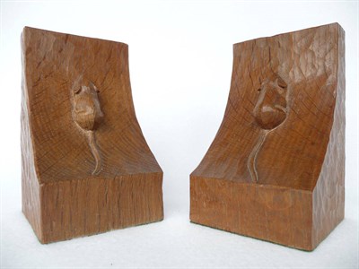 Lot 1097 - A Pair of Robert "Mouseman" Thompson Oak Bookends, each carved with a mouse, 15cm