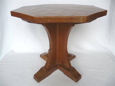 Lot 1105 - A Robert "Mouseman" Thompson Oak Octagonal Top Coffee Table, on a cruciform base, with carved mouse