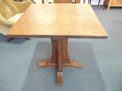 Lot 1107 - A Robert "Mouseman" Thompson Oak Table, square dowelled top, on a cruciform base, with carved mouse