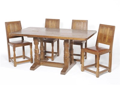 Lot 1112 - A Sid Pollard Oak Dining Room Suite, comprising an oak refectory table, dowelled three plank...