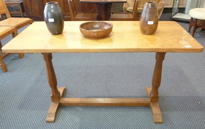 Lot 1117 - An Albert "Eagleman" Jefferies Oak Refectory Table, on two octagonal legs joined by a stretcher...