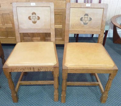 Lot 1118 - A Set of Four Albert "Eagleman" Jefferies Oak Panel Back Dining Chairs, the pierced backs with...