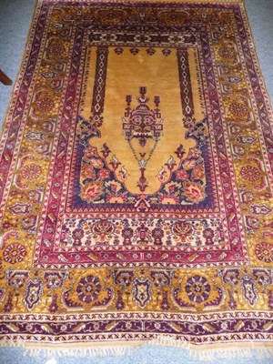 Lot 1141 - A Bursa Silk Prayer Rug West Anatolia The pale lemon field centred by a hanging lamp and flanked by