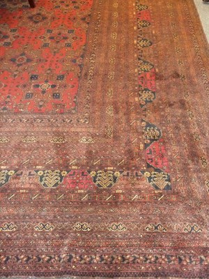 Lot 1144 - An Afghan Carpet Afghan Turkestan or North West Frontier Province The brick red field with diagonal