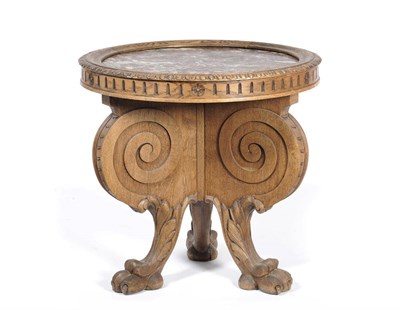 Lot 1158 - A Victorian Blonde Oak Centre Table, the circular pink and grey marble within a leaf carved and...