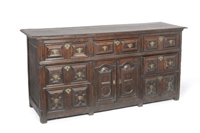 Lot 1164 - An Oak Dresser, late 17th/early 18th century, the later rectangular top above three mitred...