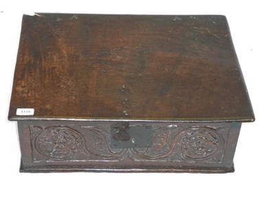 Lot 1170 - A 17th Century Boarded Oak Box, the moulded lid over a rose-and-leaf carved front, the interior...