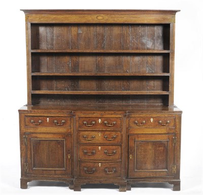 Lot 1173 - A George III Joined Oak Enclosed High Dresser, the rack with stepped cornice above a frieze...