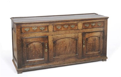 Lot 1174 - A George III Joined Oak Low Dresser, possibly Shropshire, the rectangular top above three...