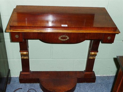 Lot 1179 - A North European Mahogany Console and Pier Glass, mid 19th century, the rectangular mirror within a