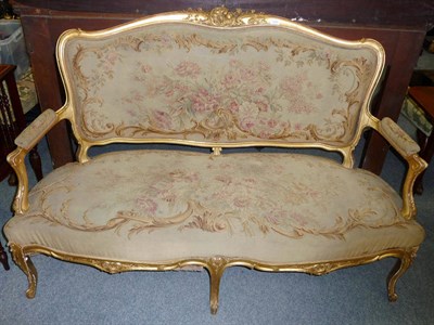 Lot 1191 - A Late 19th/Early 20th Century French Style Gilt Painted Settee, upholstered in Aubusson style...