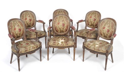 Lot 1198 - A Set of Six 18th Century  Fauteuils upholstered in floral print damask, the oval padded back...