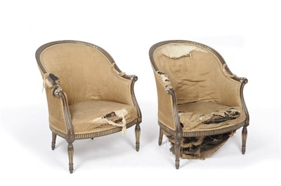 Lot 1227 - A Pair of Late 19th Century Carved and Parcel-Gilt Mahogany Bergère Chairs, upholstered in...