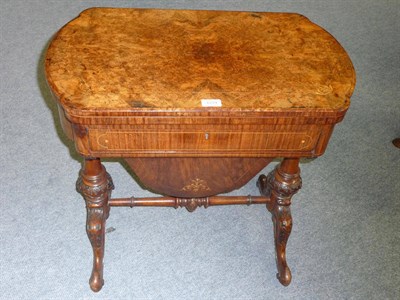 Lot 1229 - A Victorian Walnut and Marquetry Sewing Table, the shaped rectangular top opening to reveal a...