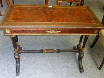 Lot 1230 - A Victorian Ebonised, Amboyna and Gilt Metal Mounted Card Table, the folding strung and crossbanded