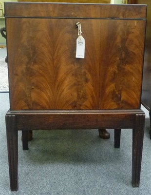 Lot 1242 - A George III Mahogany and Ebony Strung Cellaret, the rectangular body having brass handles to...