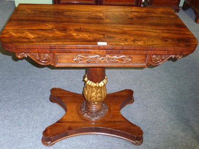 Lot 1245 - A William IV Rosewood Card Table, the rectangular rounded top opening to reveal a green baize lined