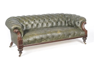 Lot 1259 - A William IV Mahogany Framed Chesterfield, upholstered in green button back leather, the...