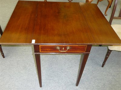 Lot 1267 - A George III Mahogany and Satinwood Banded Pembroke Table, the rectangular top with two hinged drop